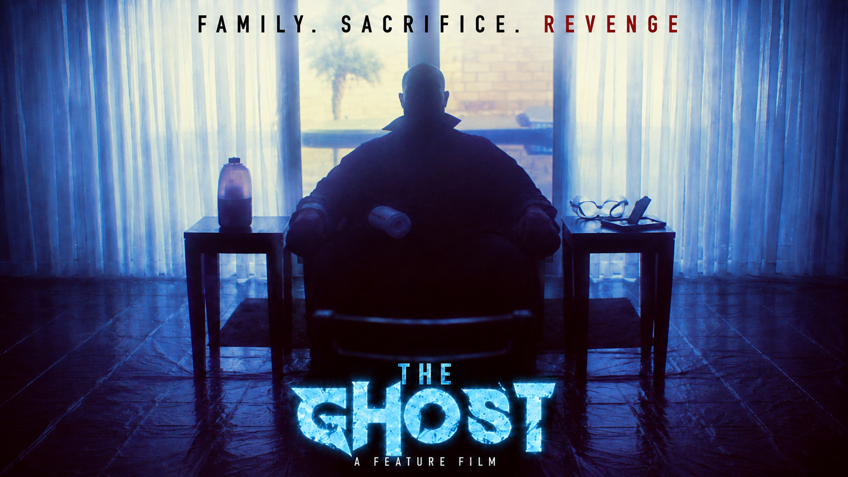The Ghost — official film artwork, blue-toned cinematic imagery